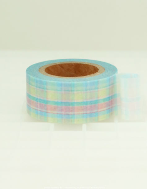 A roll of pastel plaid washi tape with light blue, pink, and yellow stripes, displayed on a clean white surface with a soft reflection.