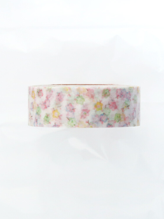 A roll of washi tape with a delicate pastel floral pattern on a white background, photographed against a clean white backdrop.